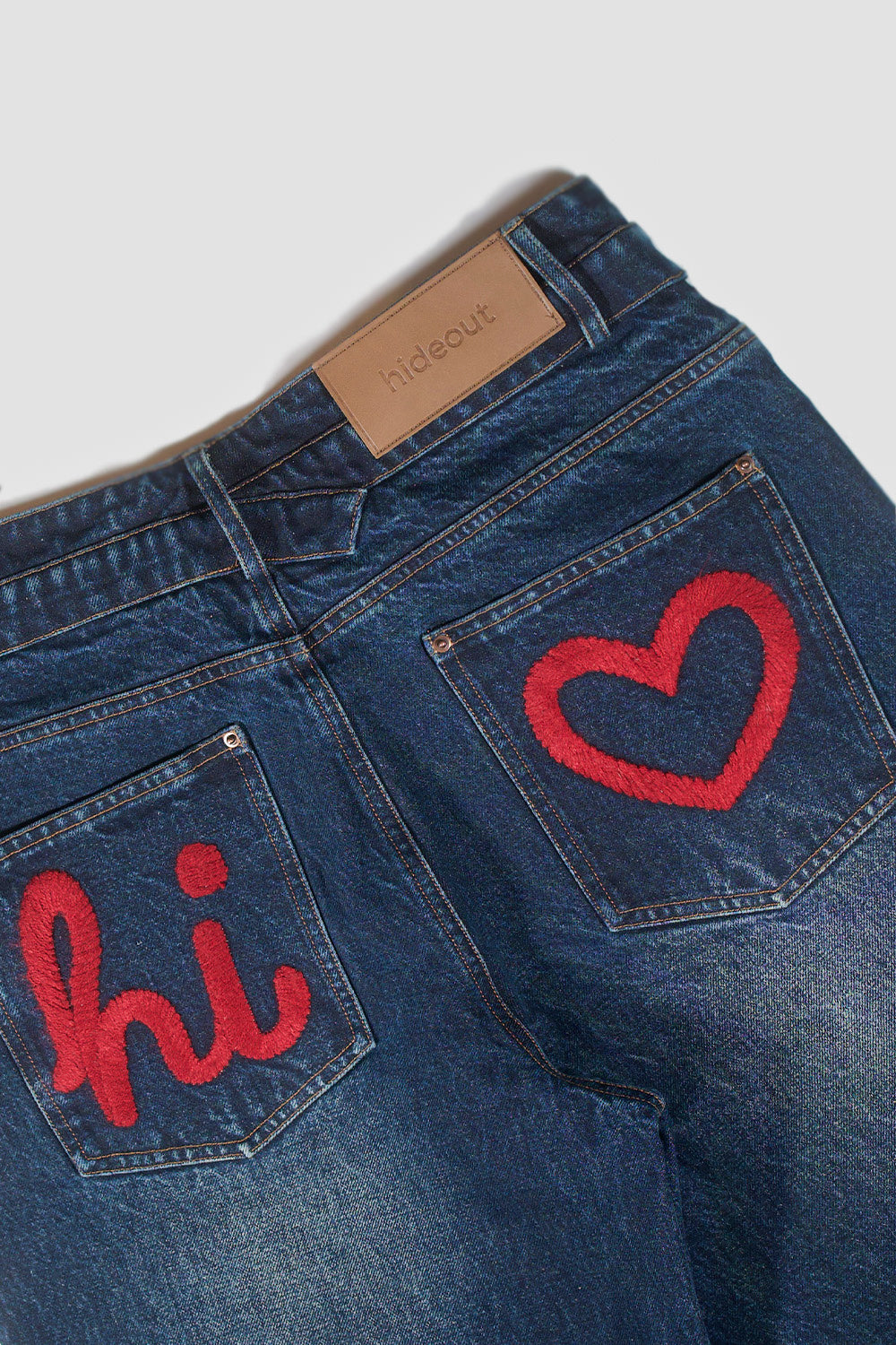 Overlap Embroidered Pocket Jeans